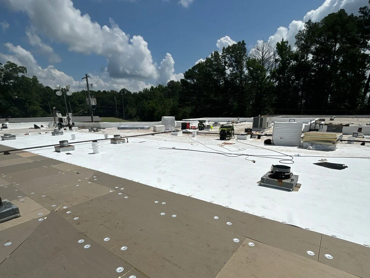 Flat and low-slope roof surface typical of Mississippi commercial buildings